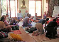 Historic mantra workshop archive photo capturing a circle of seekers in shared spiritual inquiry.